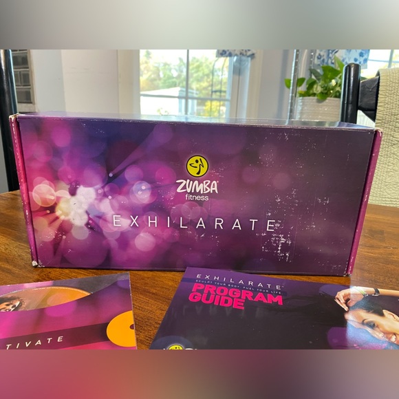 Zumba Exhilarate 7 DVD Set NIB - Picture 3 of 13